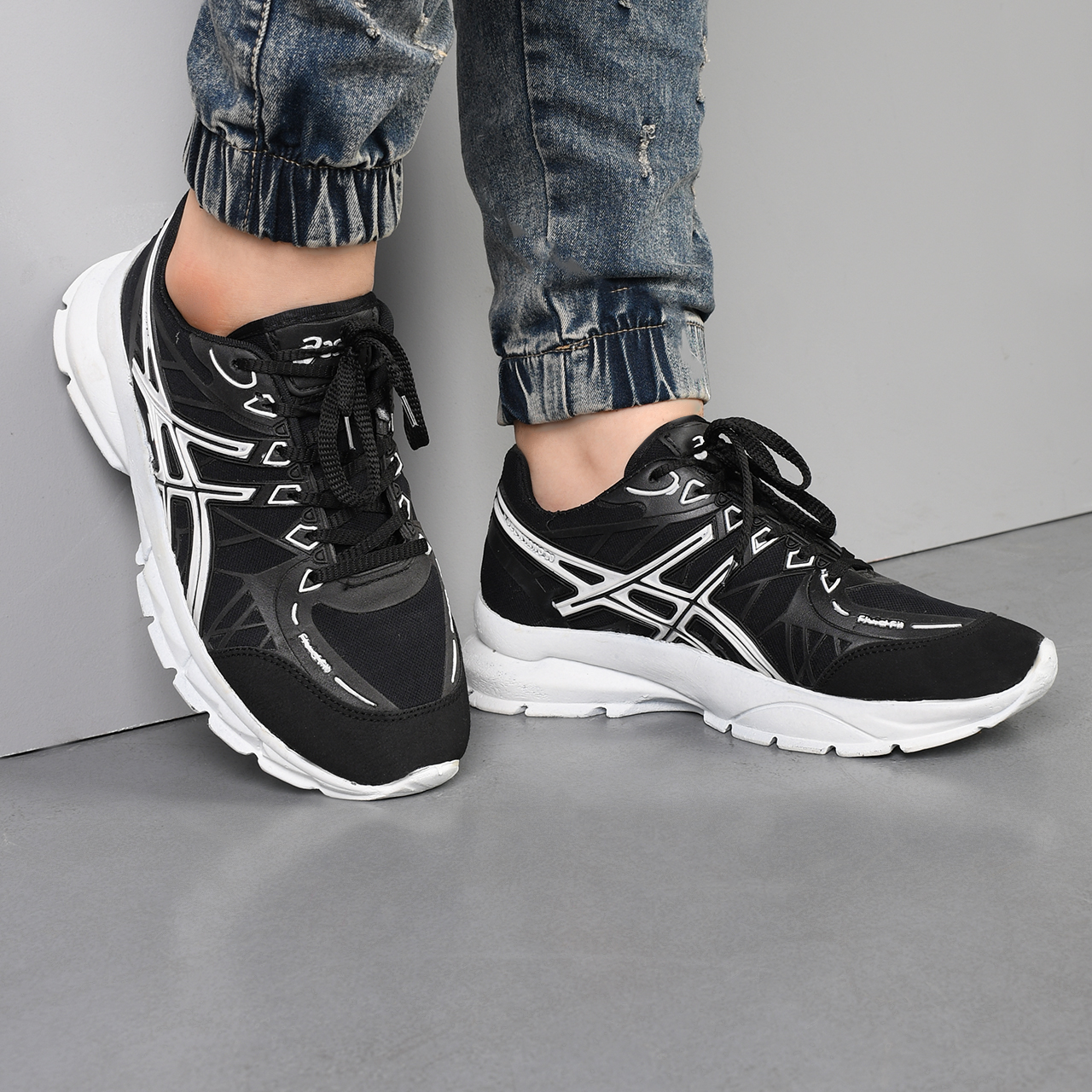 کفش ورزشی Asics مردانه مشکی سفید مدل Kaloni