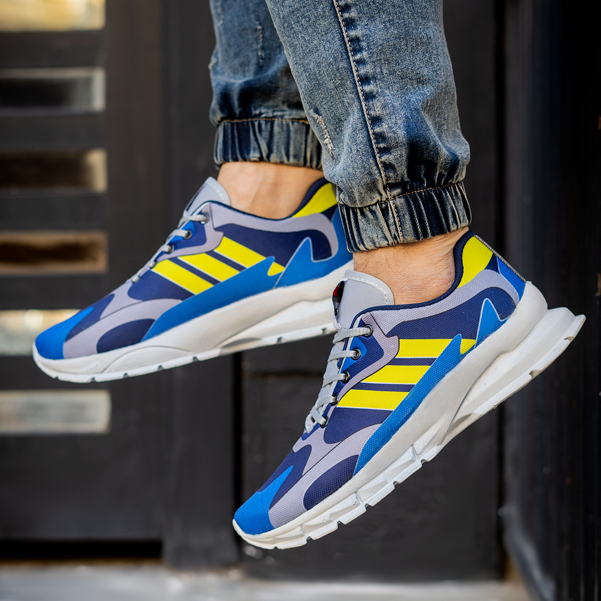 کفش ورزشی Adidas مردانه زرد آبی مدل Tacha