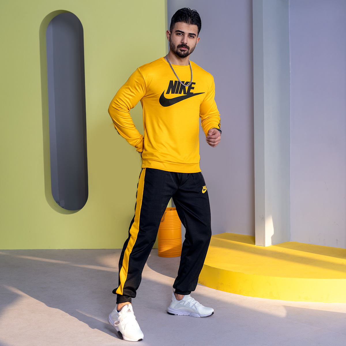 ست بلوز شلوار Nike مردانه زرد مشکی مدل Lanin