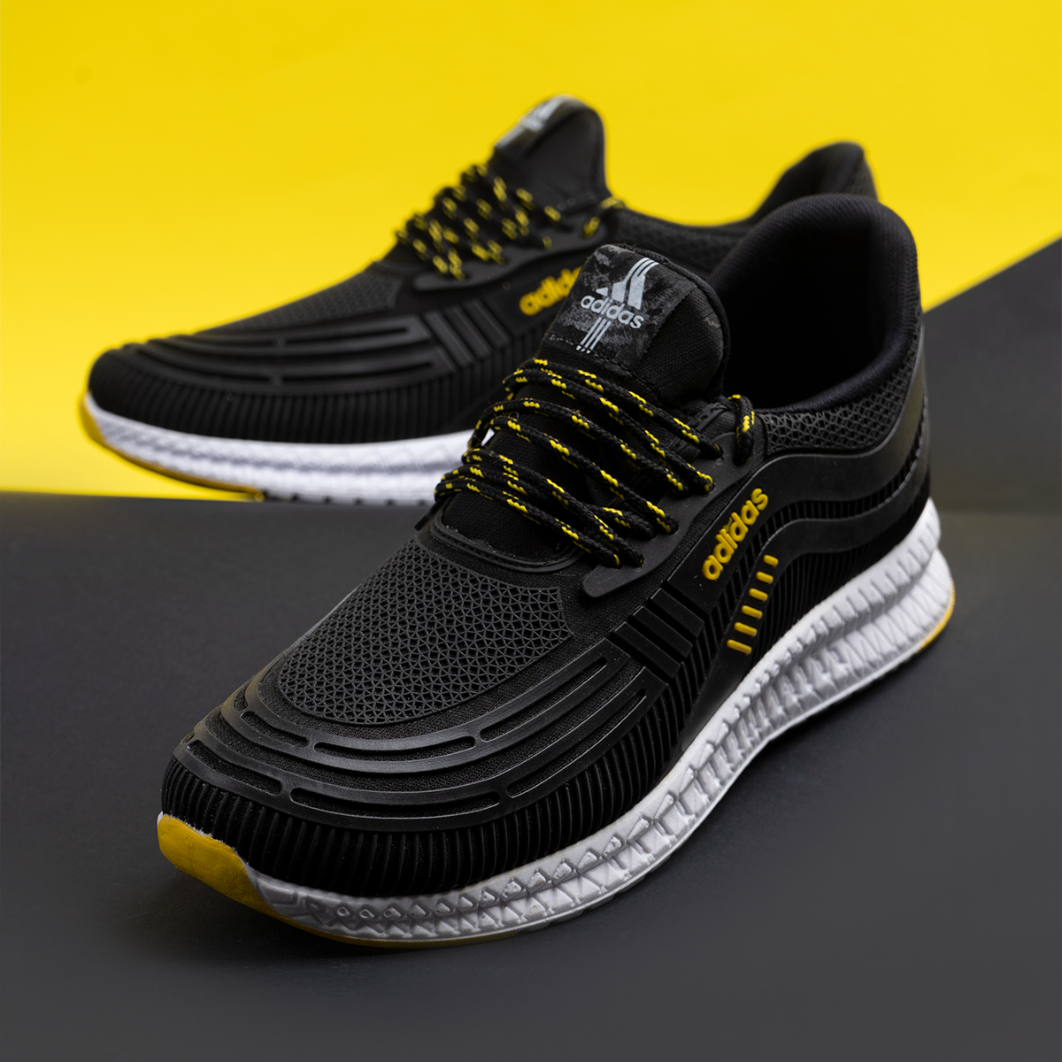 کفش ورزشی Adidas مردانه مشکی زرد مدلPardad