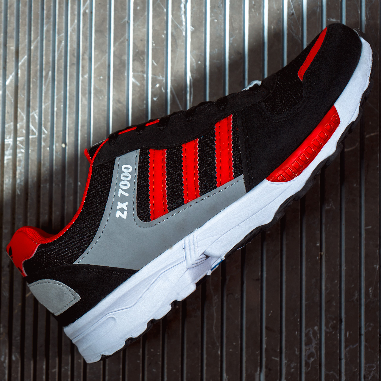 کفش ورزشی مردانه مشکی قرمز مدل ZX7000