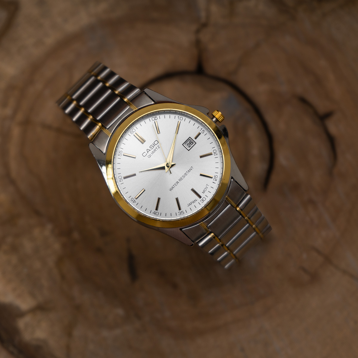 ساعت عقربه ای نقره ای طلایی صفحه سفید Casio مدل Edmon