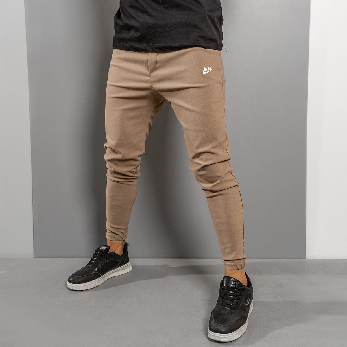 شلوار اسلش Nike کرم مردانه مدلLango