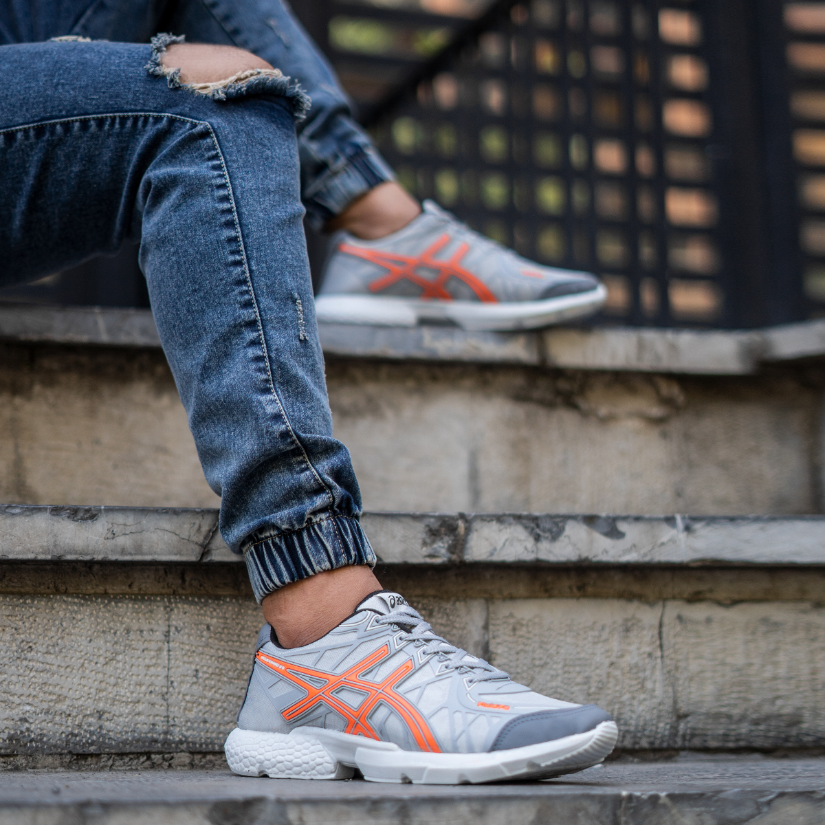 کفش ورزشی Asics مردانه طوسی نارنجی مدل Snopy