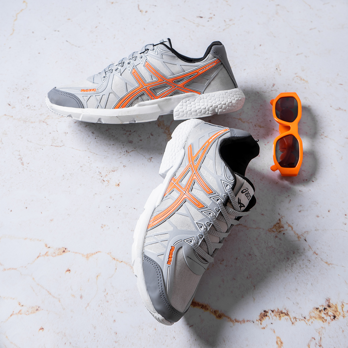 کفش ورزشی Asics مردانه طوسی نارنجی مدل Snopy