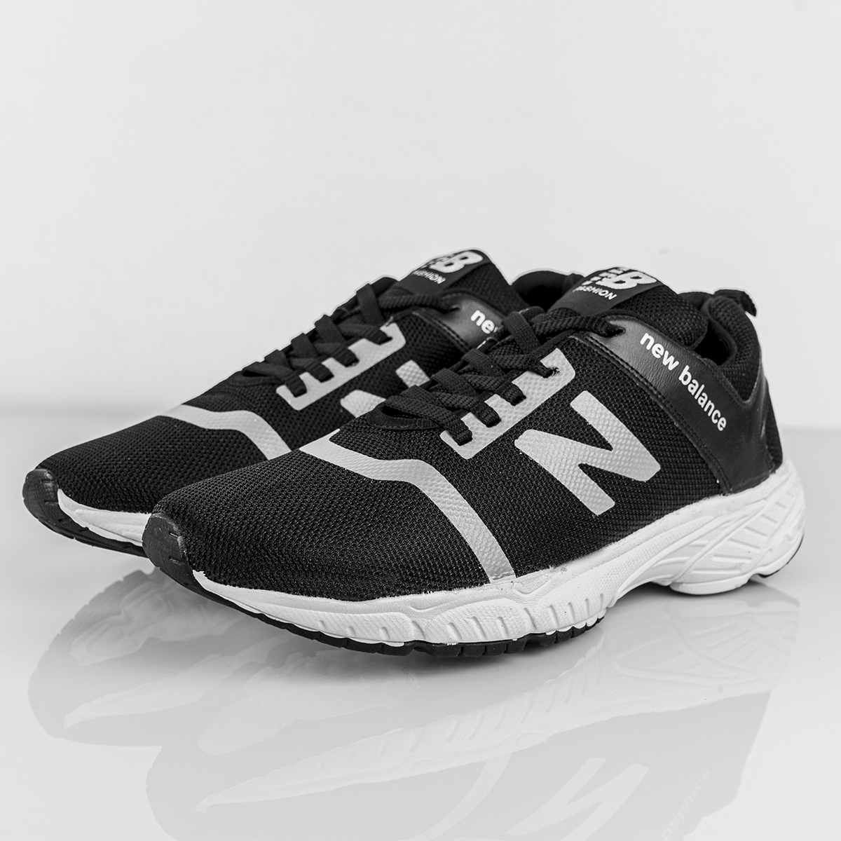 کفش ورزشی New Balance مردانه مشکی مدل Rolan