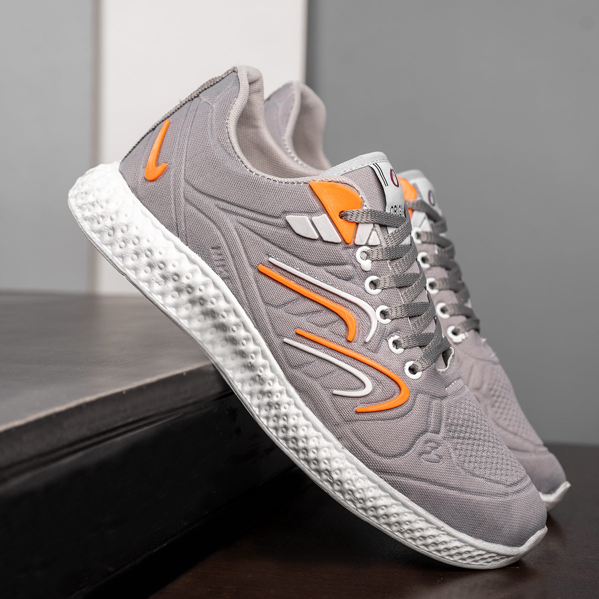 کفش saucony مردانه طوسی نارنجی مدل Delon(T)